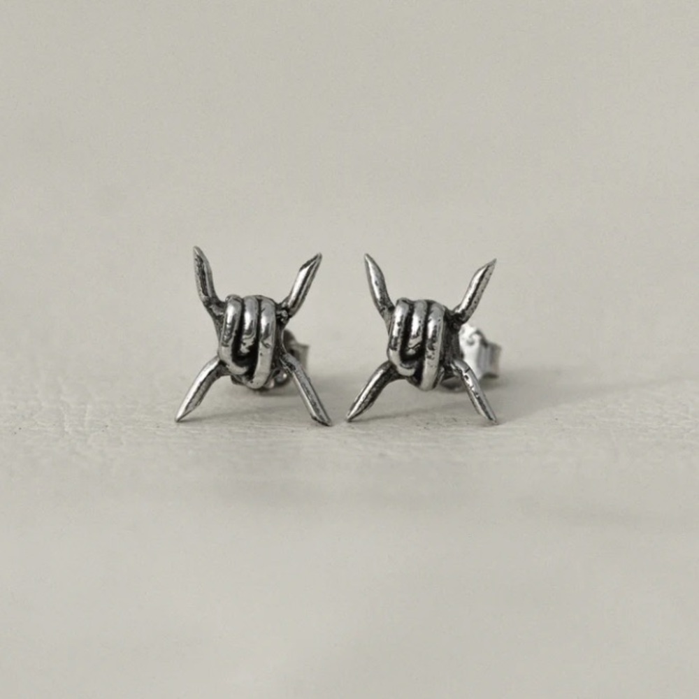 Reposeux Barb wire stud earrings in sterling silver